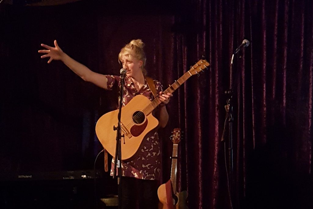 Helen Dorothy playing guitar