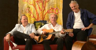 Bill Lake hero photo, three men on couch